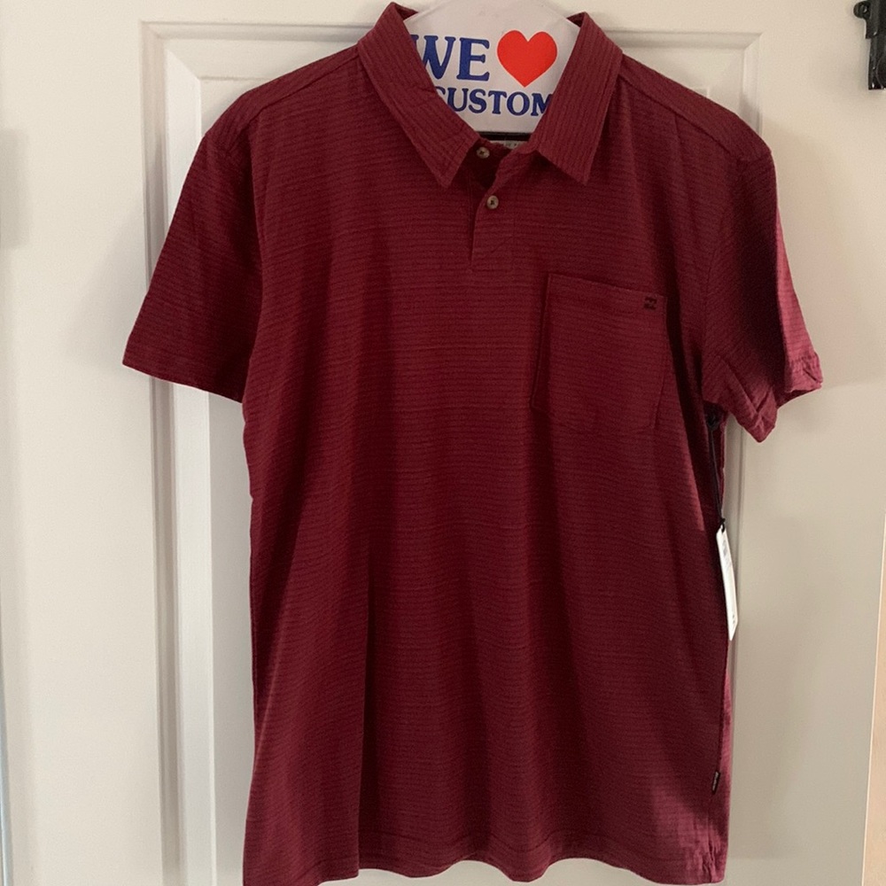 NWT Billabong Standard Issue Polo. Burgundy size small. Tags attached.